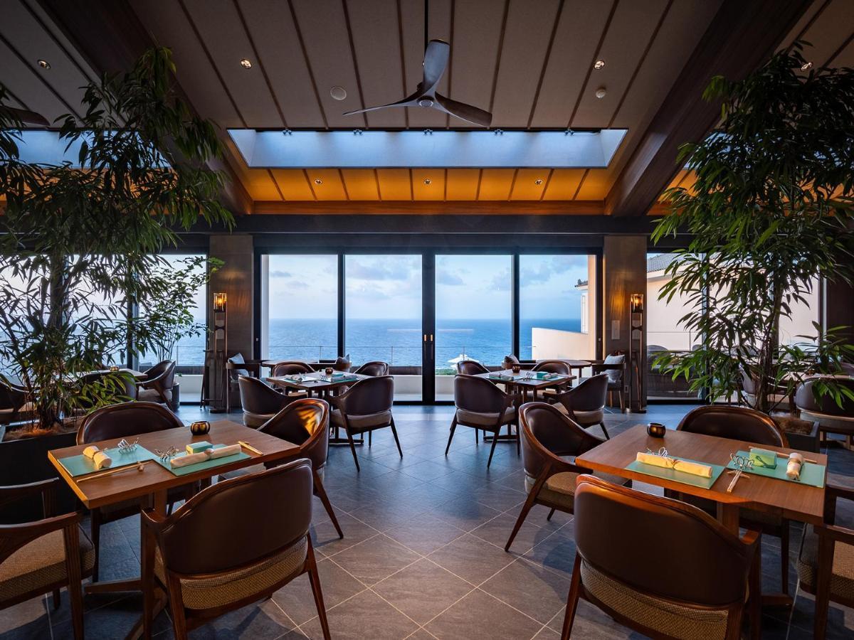 One Suite The Grand Nakijin Bagian luar foto