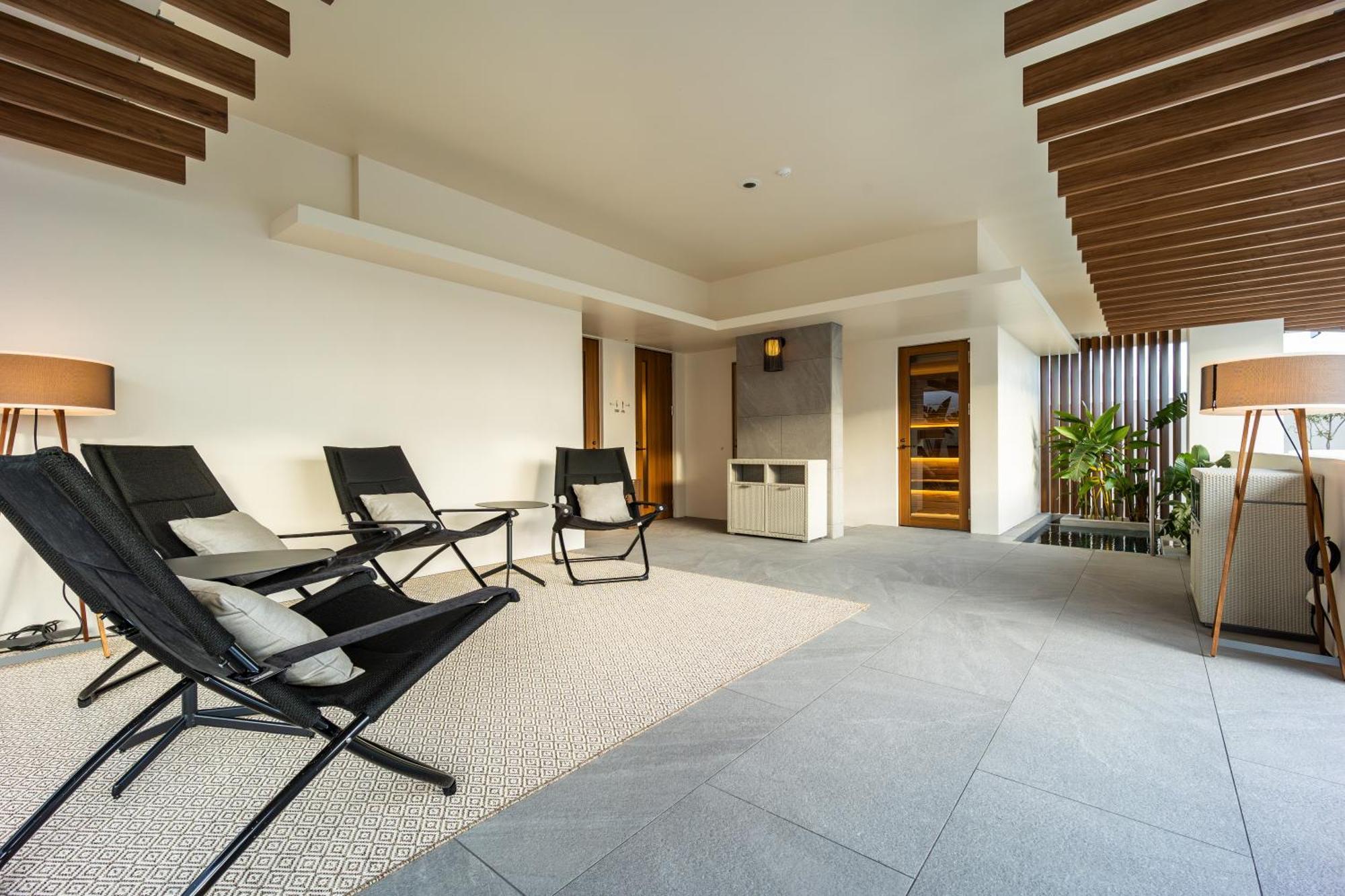 One Suite The Grand Nakijin Bagian luar foto